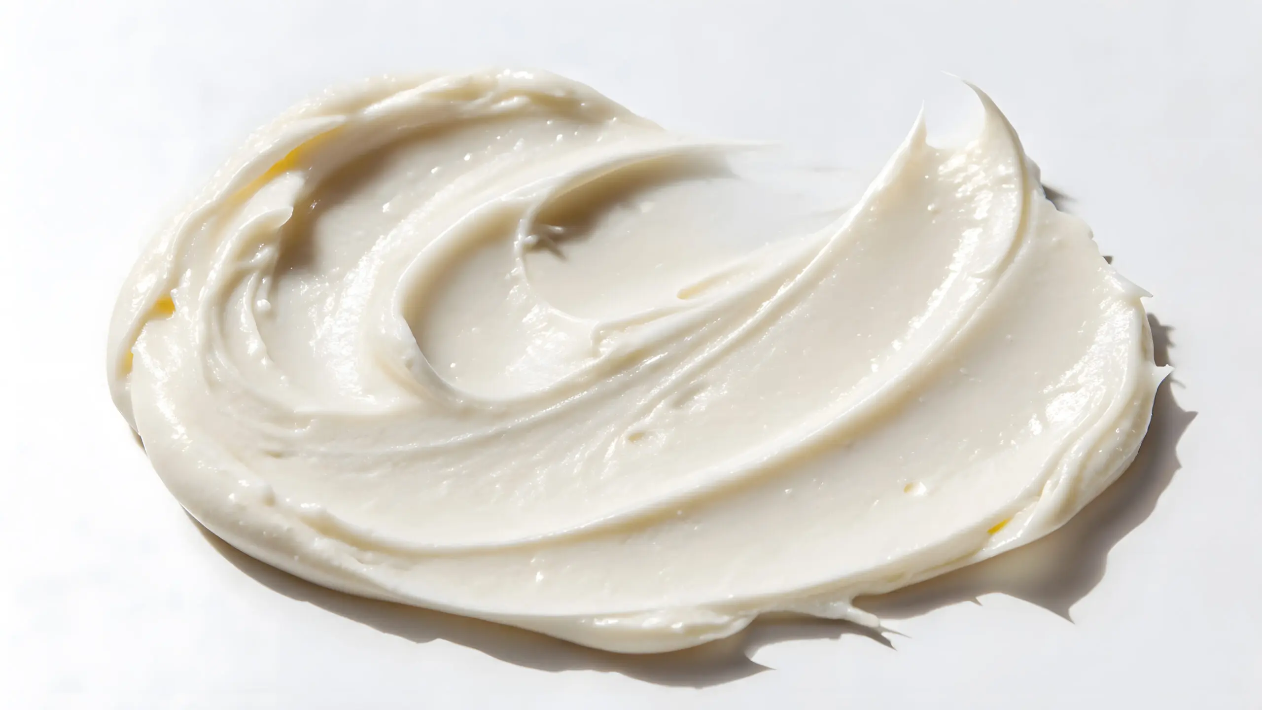 Swirl of smooth white face cream, the kind of product SNAP-8 peptide is used in